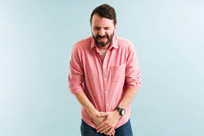 Prostate Infection Man experiencing pain from a Prostate Infection.